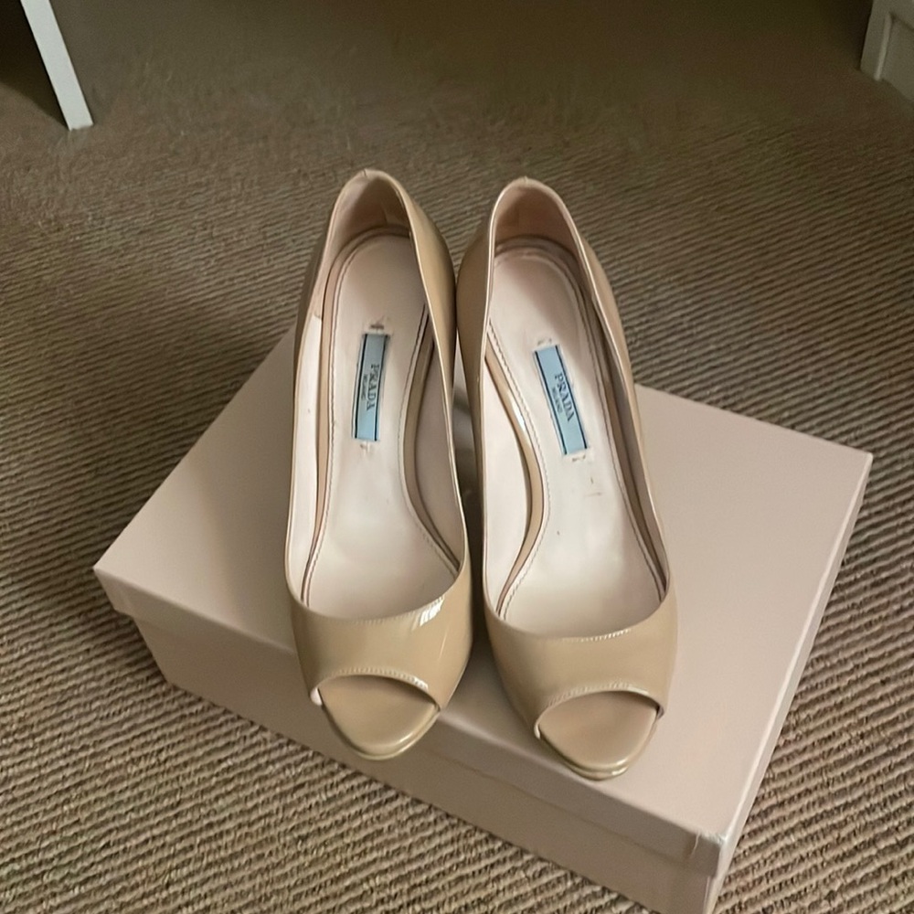 Nude Prada peep toe heels